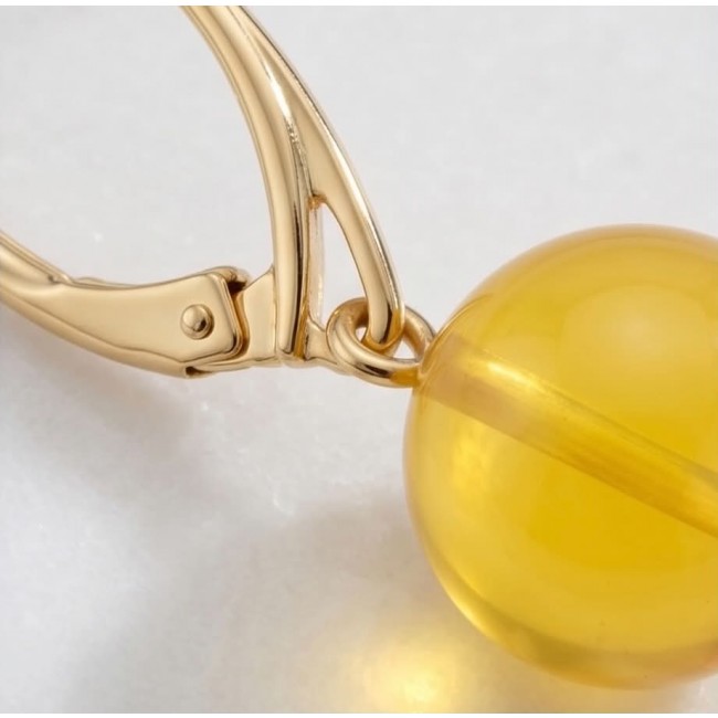 Very Special product - Wonderful Butterscotch Baltic Amber .925 Sterling Silver DIPPED IN 14k Gold entirely handcrafted earrings - Earring clasp and butterscotch Baltic amber close-up.