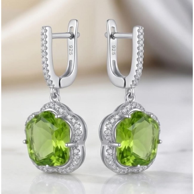 Green Clover 10.9 carat authentic Brazilian Peridot .925 Sterling Silver Handcrafted Statement Earrings - Close-up of green clover-shaped peridot earrings with silver setting.