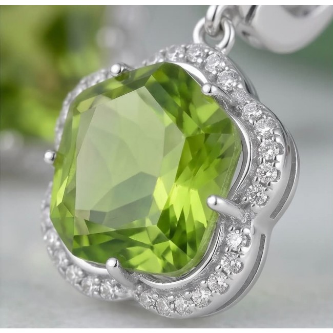 Green Clover 10.9 carat authentic Brazilian Peridot .925 Sterling Silver Handcrafted Statement Earrings - Close-up of green peridot pendant in silver setting with diamond accents.
