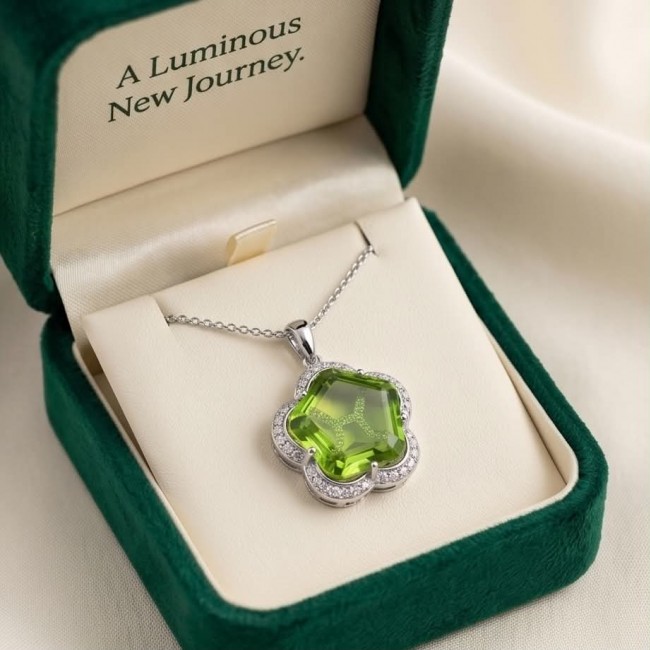 Green Clover 6.8 carat authentic Brazilian Peridot .925 Sterling Silver Handcrafted Statement pendant - Green Clover Brazilian Peridot necklace in box, top view.