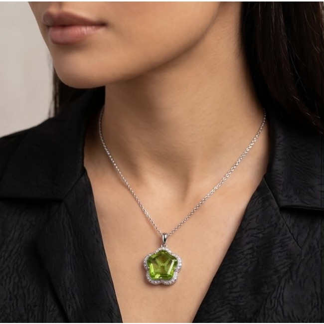 Green Clover 6.8 carat authentic Brazilian Peridot .925 Sterling Silver Handcrafted Statement pendant - Green clover pendant necklace worn close-up view.