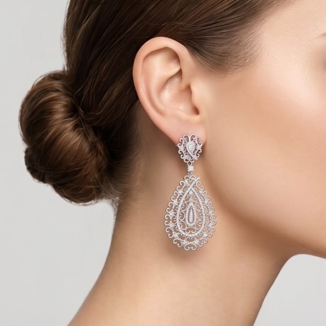 Veronica - Precious 9.5 carat White Topaz rhodium over .925 Sterling Silver .925 Sterling Silver Statement earrings - Side view of Veronica earring worn, white topaz with intricate detailing.