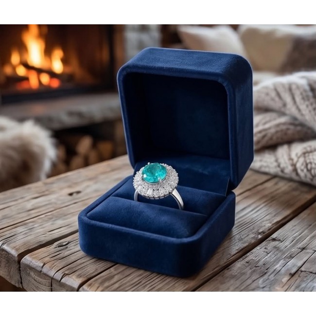Wonderland 10.5 carat Brazilian Paraiba Tourmaline .925 Sterling Silver Handcrafted Ring size 9 - Paraiba tourmaline ring in blue box by fireplace, side view.