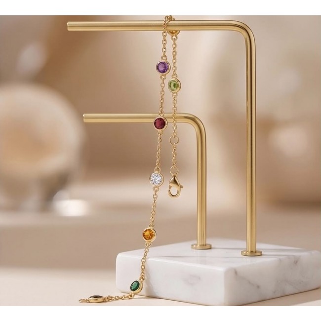 Authentic 7.5 carat Brazilian Watermelon Tourmaline 14K Gold over .925 Sterling Silver handmade Bracelet - Gold bracelet with colorful gemstones on marble stand, frontal view