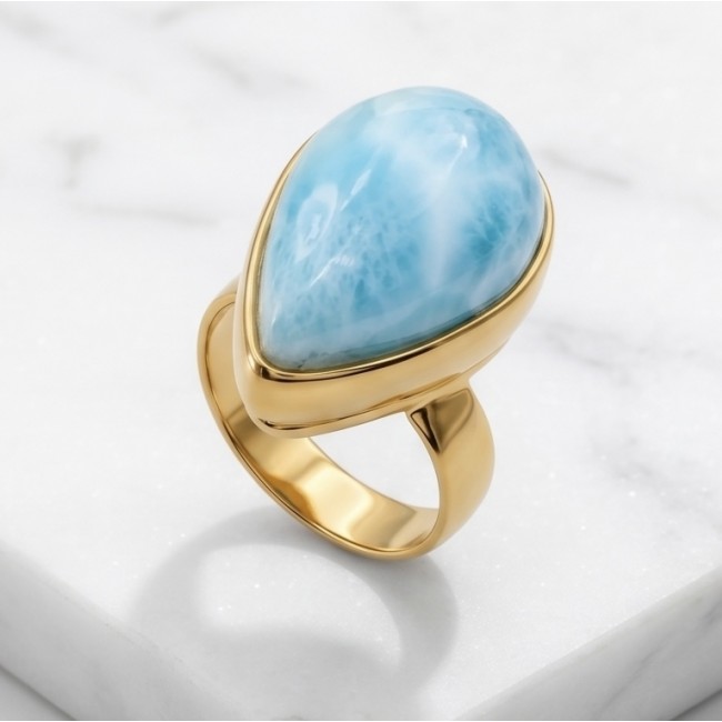 Blue Perfection Top QUALITY Blue Larimar 18K Gold over .925 Sterling Silver handmade Large ring size 8 adjustable - Gold ring with blue larimar stone, shown in a side view on marble surface.