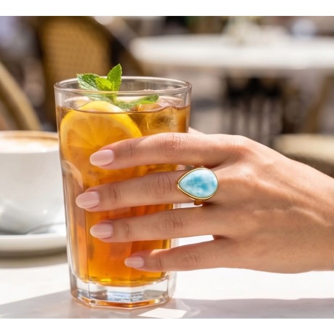 Blue Perfection Top QUALITY Blue Larimar 18K Gold over .925 Sterling Silver handmade Large ring size 8 adjustable - Hand wearing Blue Larimar ring holding iced tea with lemon and mint.