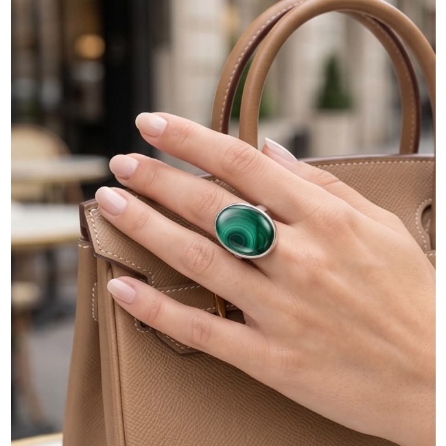 Green Aura 33.2 CARAT genuine Malachite from Utah .925 Sterling Silver handcrafted ring size 8 adjustable - Hand wearing Green Aura 33.2 carat malachite ring, holding a tan bag.