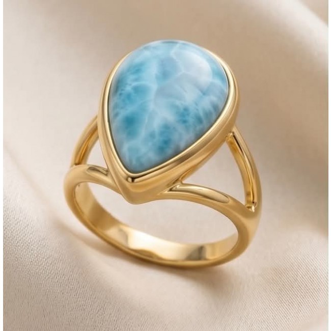 Treasure of Dominican Republic 12.5 carat genuine Larimar .925 Sterling Silver dipped in 22K Gold over Handcrafted Ring size 6 - Gold ring with pear-shaped Larimar stone on satin background.