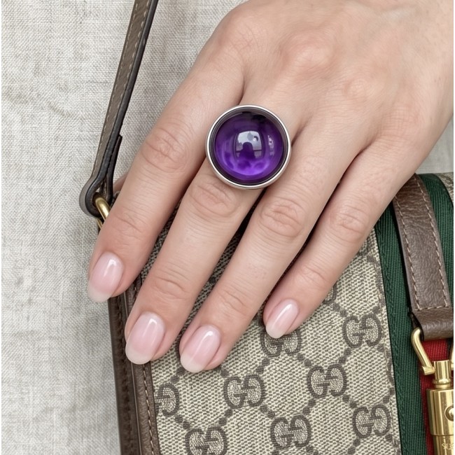 Top quality 22.5 carat Amethyst .925 Sterling Silver Handcrafted Large Ring size 7 - Amethyst sterling silver ring worn on hand, holding a designer bag.
