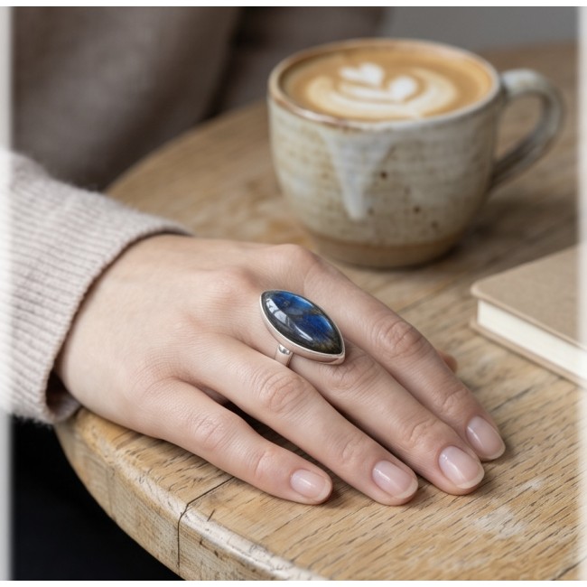 Shimmering Natural Labradorite .925 Sterling Silver handcrafted Large ring size 8 adjustable - Labradorite silver ring worn on hand, with coffee cup in background.