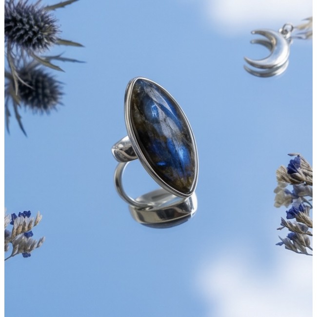 Shimmering Natural Labradorite .925 Sterling Silver handcrafted Large ring size 8 adjustable - Close-up of shimmering labradorite ring against sky background