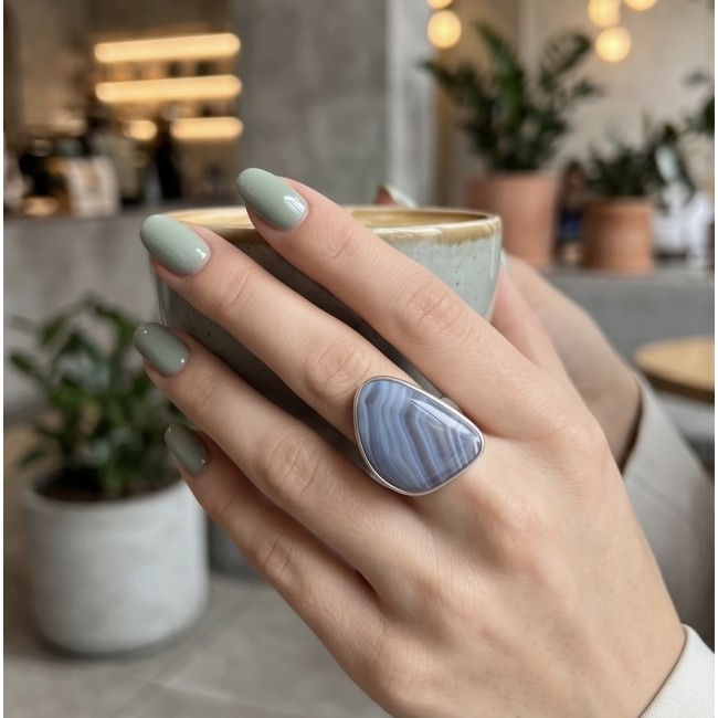Top quality Scentic Botswana Agate .925 Sterling Silver handcrafted Ring s. 7 adjustable - Agate ring worn on hand with sage green nails holding a cup.