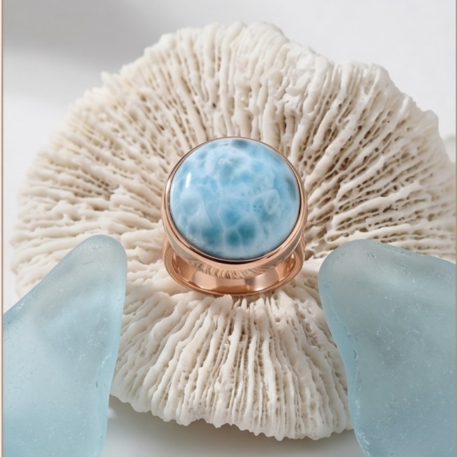 Perfection 22.9 carat Blue Larimar 22K Rose Gold over .925 Sterling Silver handmade ring size 8 adjustable - Close-up of blue Larimar ring on coral background, rose gold setting