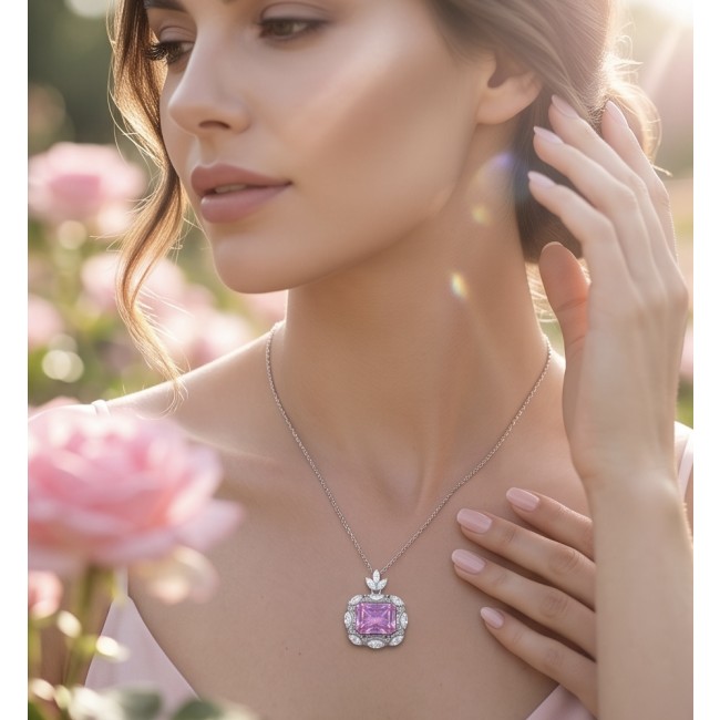 Vintage style boquette cut 12.8 carat Pink Sapphire .925 Sterling Silver DIPPED IN RHODIUM handmade Pendant - Woman wearing pink sapphire necklace in a garden setting.