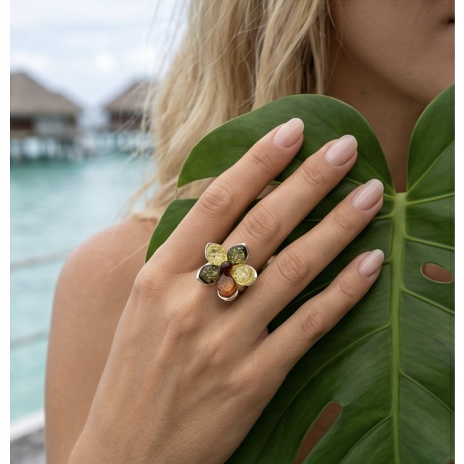 Golden Flower Authentic Baltic Amber rhodium over .925 Sterling Silver handcrafted ring; s. 7 adjustable - Golden Flower Baltic Amber ring worn on hand, tropical background