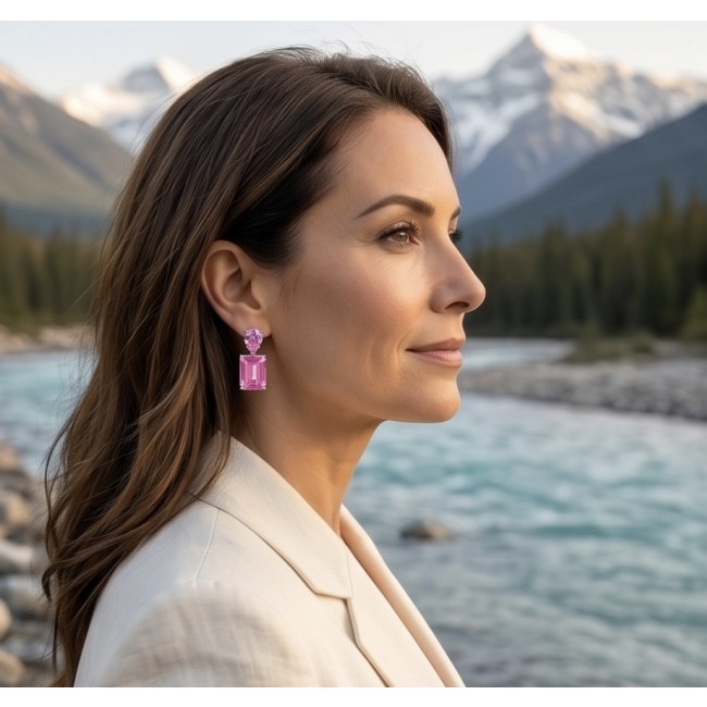 Large - Tiffany - authentic baquette cut 45.4 carat Pink Sapphire .925 Sterling Silver handcrafted Earrings - Side view of large pink sapphire earrings worn by woman.