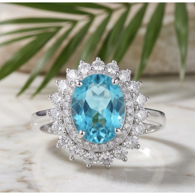 WONDERLAND 15.5 carat Paraiba Tourmaline .925 Sterling Silver Handcrafted Ring size 9 - Close-up of WONDERLAND 15.5 carat Paraiba Tourmaline ring on marble surface.
