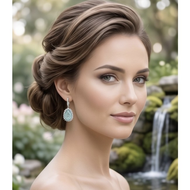 Angelina 20.9 carat authentic Aquamarine .925 Sterling Silver Handcrafted Earrings - Side view of worn Angelina aquamarine earrings with waterfall backdrop.