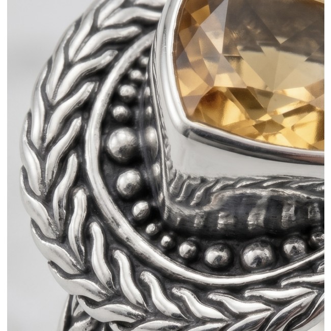 Solid 9.8 carat Genuine Citrine .925 Sterling Silver handcrafted ring size 7 - Close-up of a citrine stone set in ornate sterling silver jewelry.