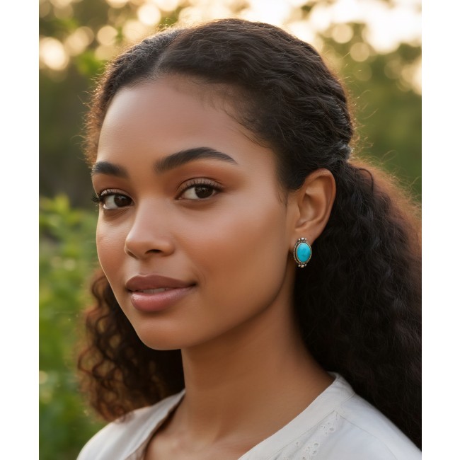 Great authentic Morenci Turquoise .925 Sterling Silver handcrafted Earrings - Woman wearing Morenci Turquoise .925 Silver earrings, side view.