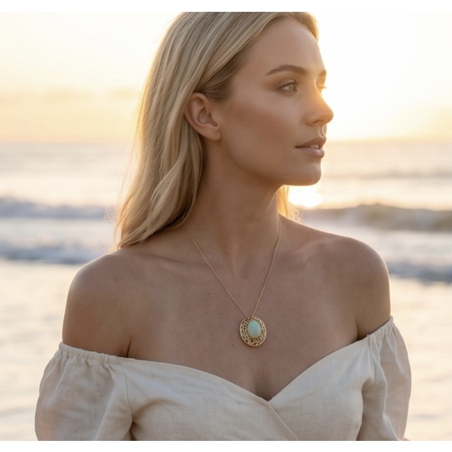 Earth Treasure Authentic 12.8 carat Golden Ethiopian Opal 22K Gold over .925 Sterling Silver handcrafted Statament Necklace - Necklace with Ethiopian Opal worn on model, side view at sunset.