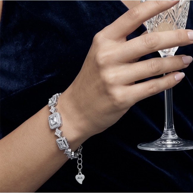 Carolyn - Precious 15.7 carta White Topaz rhodium over .925 Sterling Silver .925 Sterling Silver Statement Bracelet - Bracelet on wrist, holding glass; Carolyn - Precious 15.7 carta White Topaz