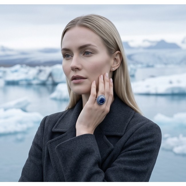 Julietta 14.8 carat London Blue Topaz .925 Sterling Silver handmade Statement Ring size 6 - Woman wearing Julietta ring with London Blue Topaz in icy landscape