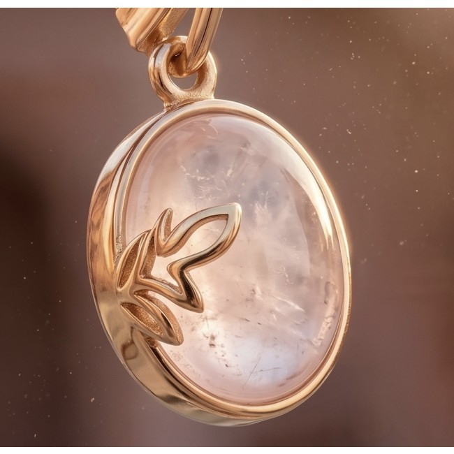 Authentic 10.2 carat Rose Quartz 14K Gold over .925 Silver handcrafted Statement earrings - Close-up of rose quartz pendant in gold setting.