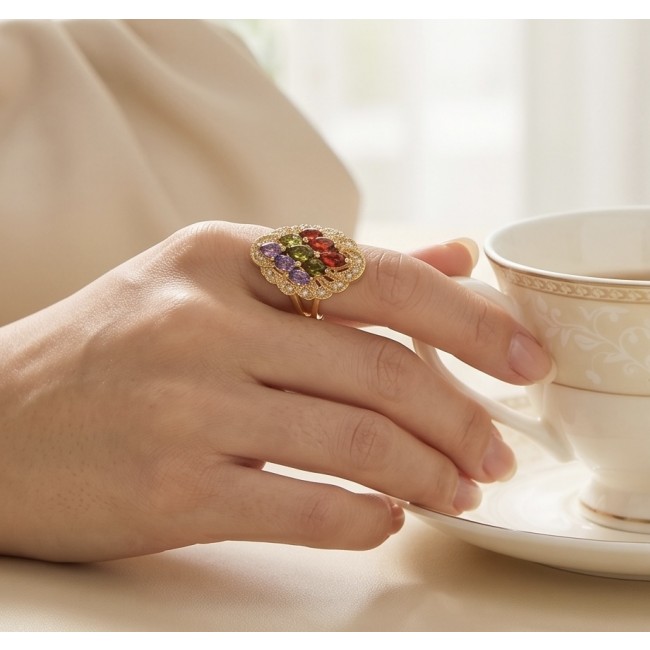 Classy Beauty - authentic 8.7 carat multigem .925 Sterling Silver dipped in 14K Gold Eternity Ring size 6 - Multigem ring worn on hand, holding a teacup, showcasing detail.