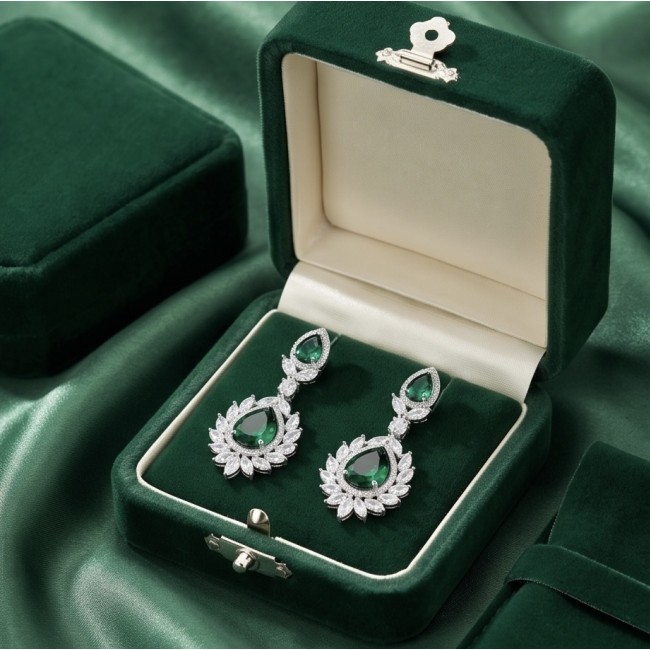 Magnificent Jewel 17.5 carat Emerald 14K white Gold over .925 Sterling Silver handcrafted earrings - Elegant emerald earrings in a green velvet box, top view