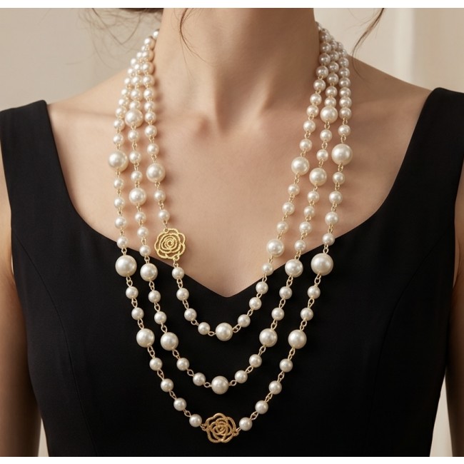 Sublime 60 inches long FRESH WATER PEARL 10k Gold over .925 Sterling Silver handmade Necklace - Pearl necklace with gold accents worn on a model in black dress