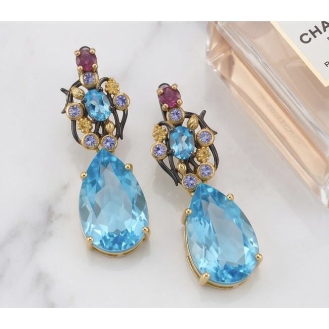 Atlantica 18.7 carat Swiss Blue Topaz BLACK RHODIUM OVER and 18k Gold .925 Sterling Silver Handcrafted Statement earrings - Close-up of Atlantica earrings with Swiss blue topaz and gemstones.