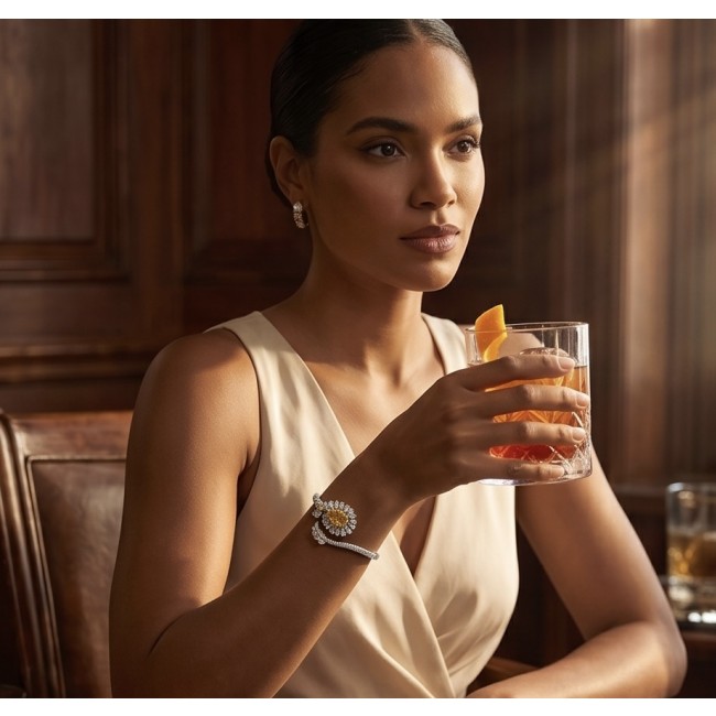 Dolce Vita - Precious Natural 18.5 carat yellow Sapphire .925 Sterling Silver handcrafted LARGE bracelet - Woman wearing bracelet and earrings, holding a drink.