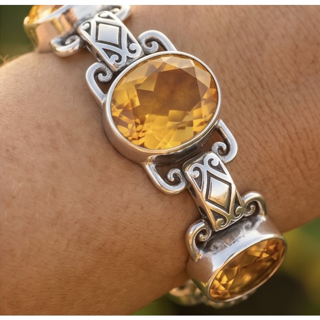 Spectacular oval cut 65.5 carat Lemon Quartz .925 Sterling Silver handcrafted bracelet - Oval Lemon Quartz bracelet close-up, worn on wrist