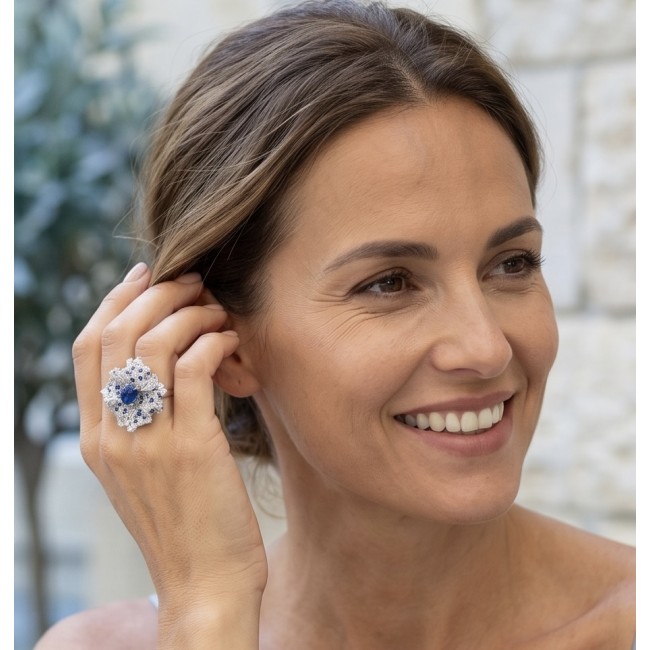 Blue Flower 12.2 carat natural Sapphire .925 Sterling Silver Perfectly handcrafted Ring s. 7 1/4 - Woman wearing Blue Flower sapphire ring, side view close-up.