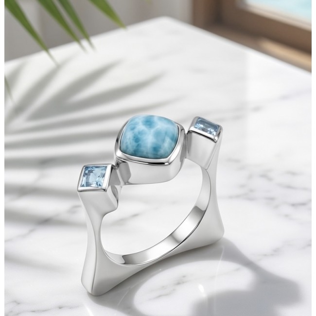 Caribbean Beauty 4.5 carat Genuine Blue Larimar .925 Sterling Silver handmade ring size 8 1/4 - Side view of silver ring with blue Larimar and square stones on marble surface.