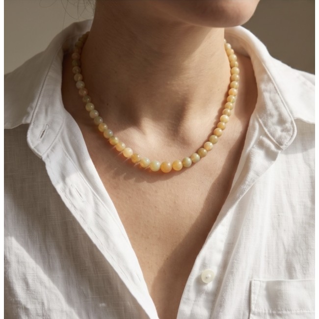 Real Masterpiece Natural Ethiopian Opal .925 Sterling Silver Necklace - Necklace worn on neck, highlighting Ethiopian Opal beads and white shirt.