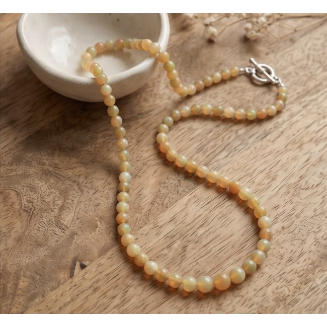 Real Masterpiece Natural Ethiopian Opal .925 Sterling Silver Necklace - Ethiopian opal necklace on wood, showing clasp side view.