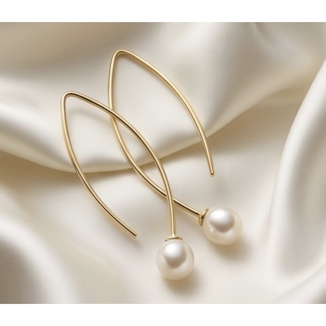 Summer Time Pearl 14K Gold over .925 Sterling Silver handcrafted long Earrings - Gold and pearl earrings on satin fabric, top view.