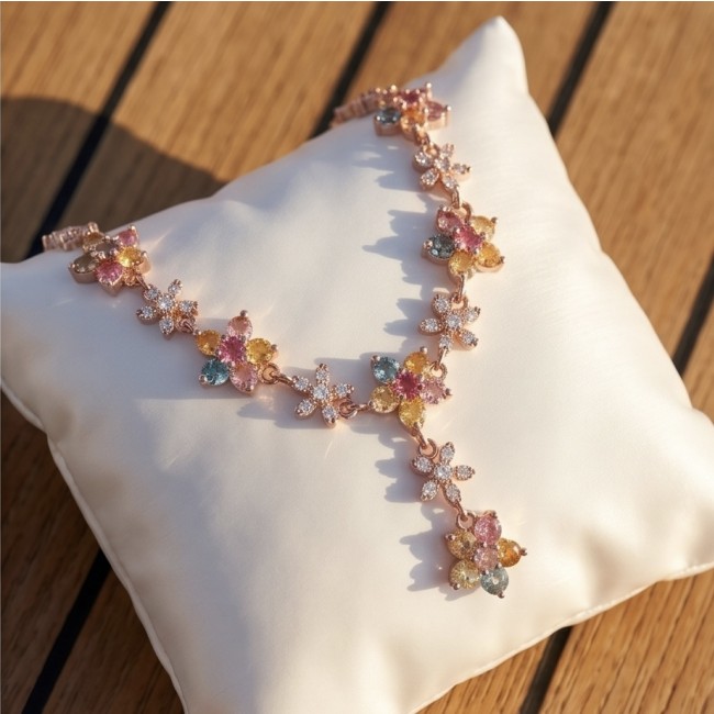 Luxurious - 10.5 carat yellow multicolor Sapphire .925 Sterling Silver dipped in 18K Rose Gold handcrafted Necklace - Top view of multicolor sapphire necklace on a cushion