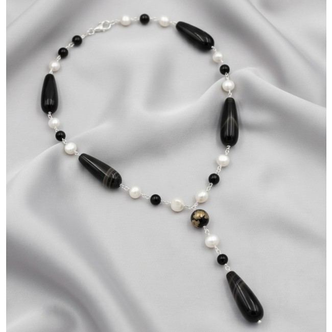 Black and White 26 inches authentic Onyx Pearl .925 Sterling Silver handmade Station Necklace - Black and white onyx pearl necklace on a draped fabric background.