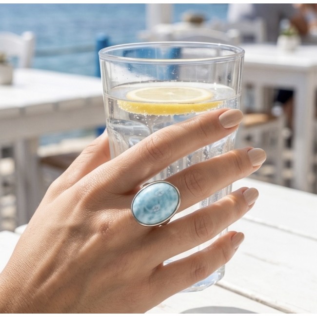 26.8 carat Blue Perfection natural Larimar .925 Sterling Silver handmade Large ring size 8 adjustable - Larimar ring worn on hand holding a glass with lemon slice.