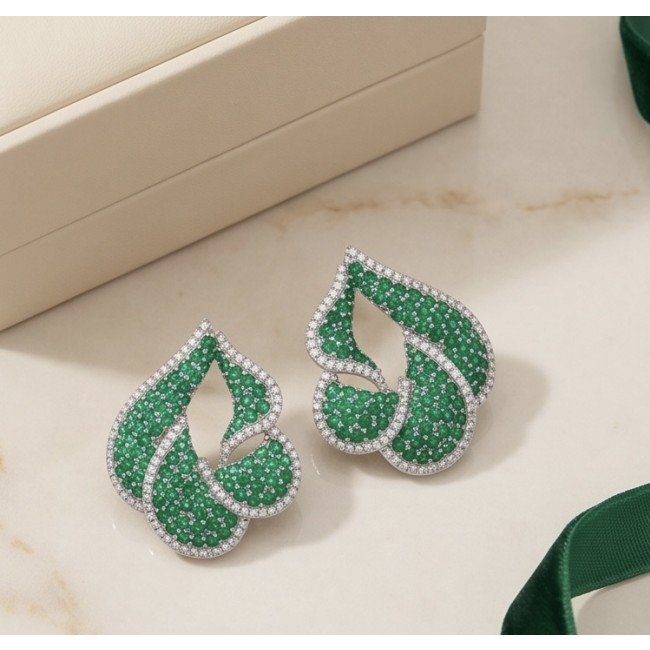 Royalty 7.9 carat authentic pave Colombian Emerald .925 Sterling Silver dipped in Rhodium Handcrafted Statement Earrings - Pave emerald earrings on marble with box, top view.