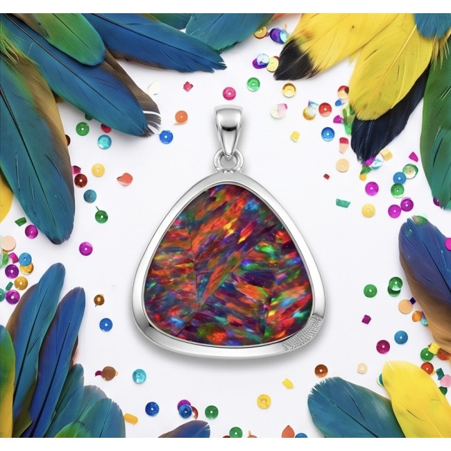 Kaleidopscop 19.5 carat Australian Doublet Opal .925 Sterling Silver handcrafted pendant - Opal pendant close-up with colorful feathers and sequins background.