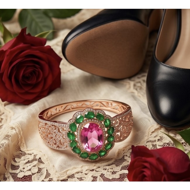 Ultimate Escape Luxurious Pink Rainbow Topaz 18K Rose Gold over .925 Sterling Silver handmade Bracelet - Close-up of pink topaz bangle on lace with roses and shoes.