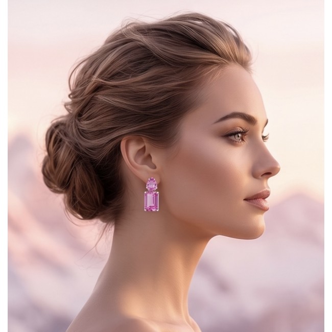 Large - Tiffany - authentic baquette cut 48.7 carat Pink Sapphire .925 Sterling Silver handcrafted Earrings - Side view: woman wearing large baguette-cut pink sapphire earring.
