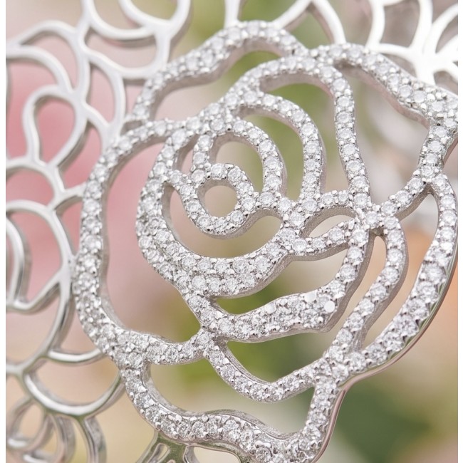 Dolce Vita - Precious Natural 12.5 carat White Topaz rhodium over .925 Sterling Silver handcrafted bracelet - Close-up of diamond-studded floral pattern on Dolce Vita jewelry piece