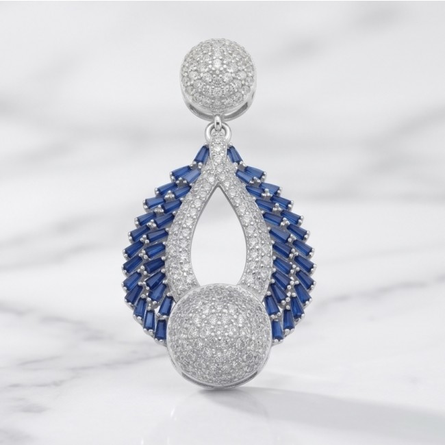 Heirloom Genuine 8.5 carat Sapphire .925 Sterling Silver dipped in rhodium handmade Pendant - Sapphire and silver earring, front view on marble background.