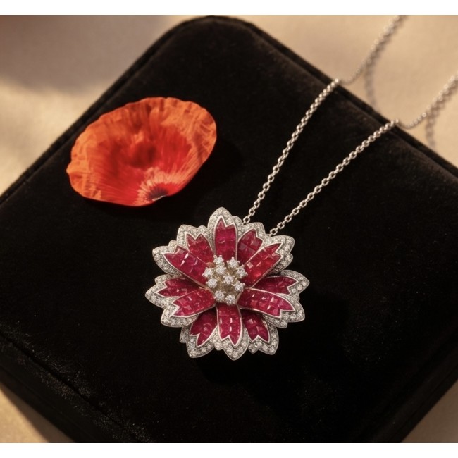 Borm to Glam Genuine mystery setting 8.5 carat Ruby .925 Sterling Silver handmade Pendant - Close-up of floral ruby necklace on black velvet with flower petal prop.