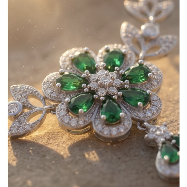 Giovanna - Authentic 10.9 carat Colombian Emerlad .925 Sterling Silver handcrafted Statement necklace - Close-up of flower-shaped emerald and diamond jewelry in sunlight